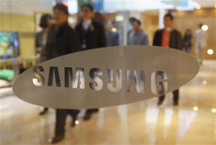 People walk at the main office building of Samsung Electronics in Seoul