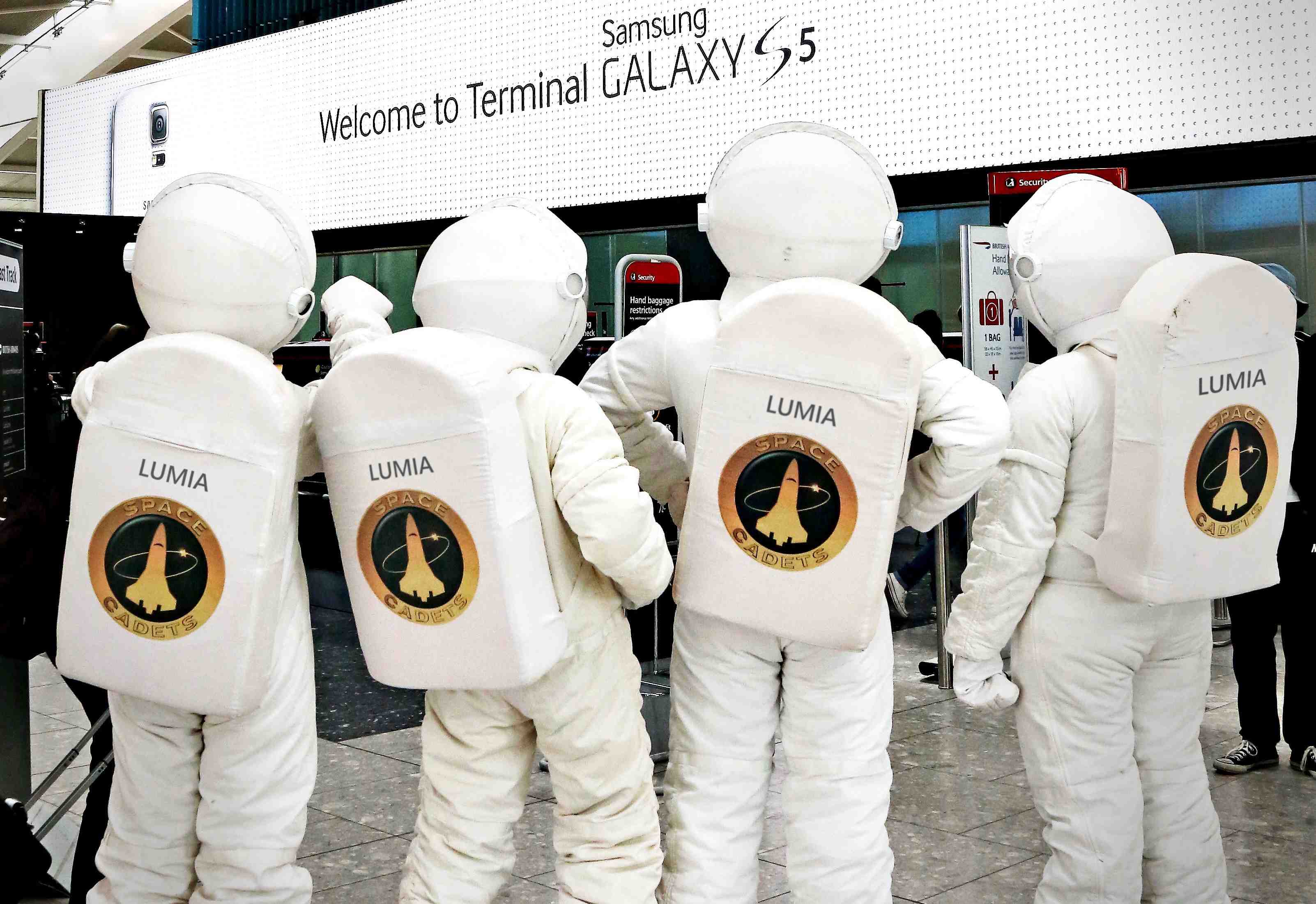 Microsoft-Devices-give-a-tongue-in-cheek-reaction-to-the-advertising-takeover-of-Heathrow-Terminal-5-by-sending-astronauts-in-search-of-the-elusive-flight-to-the-Galaxy.