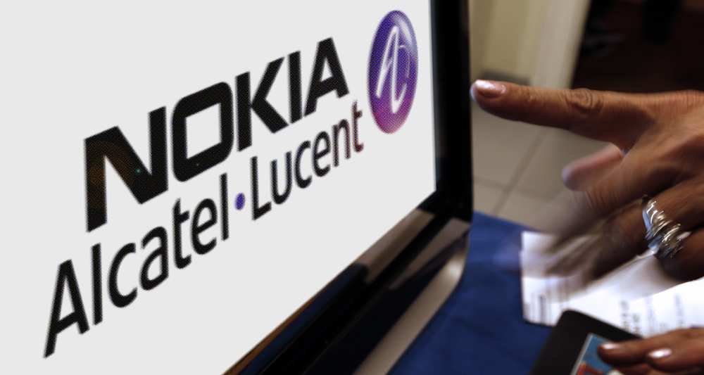 1111103_fusion-alcatel-nokia-pas-de-suppression-demplois-en-france-assure-macron-web-tete-0215012336