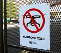 A no drone sign warning sign from the Federal Aviation Administration is seen outside the Republican National Convention in Cleveland, Ohio, U.S. July 20, 2016. REUTERS/Aaron Josefczyk