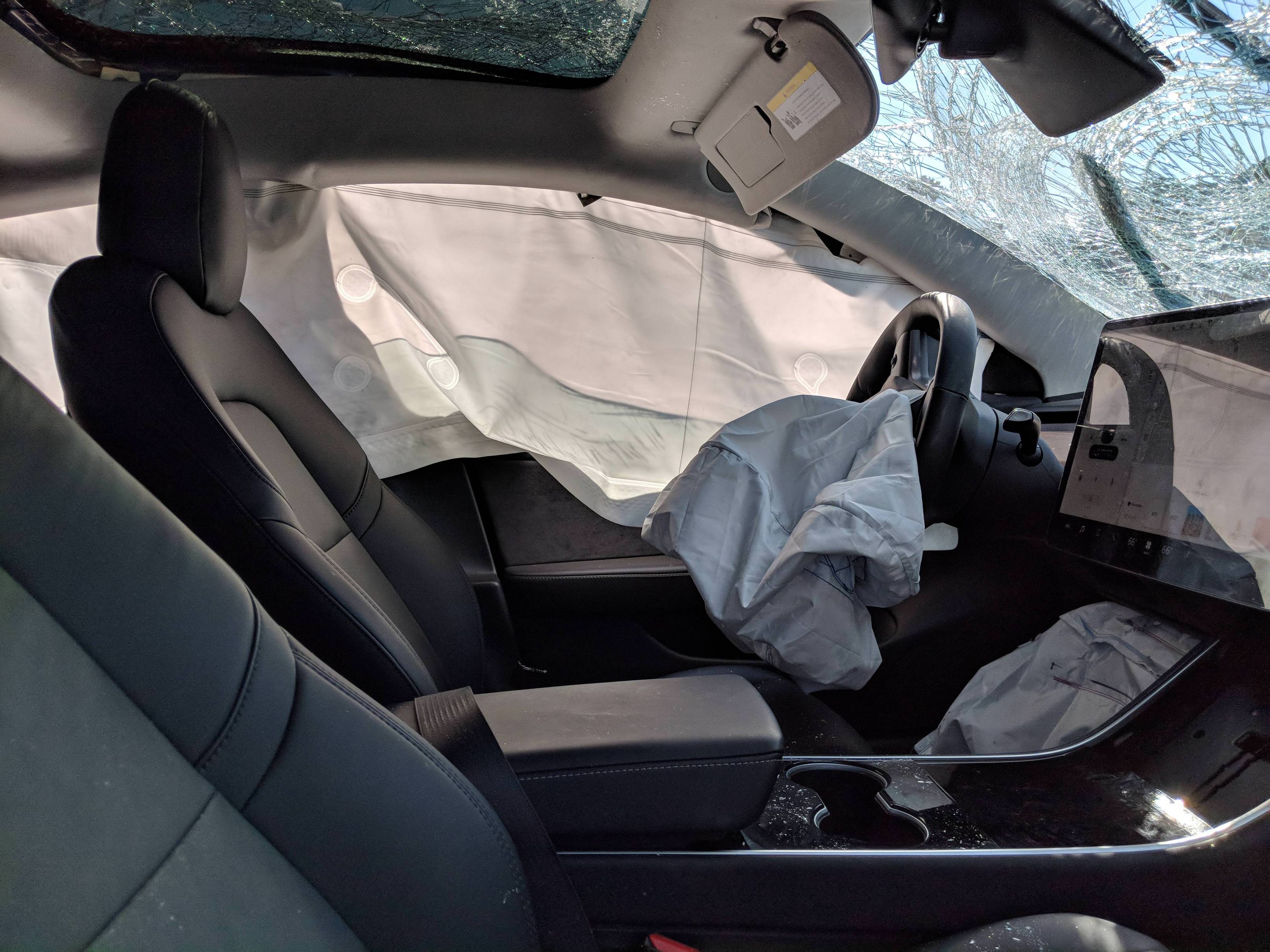 Tesla Model 3 destroyed inside b