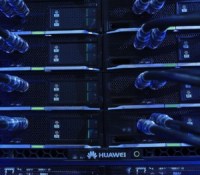 Blue light illuminates cables on an E9000 blade server rack, manufactured by Huawei Technologies Co. Ltd., at the CeBIT 2017 tech fair in Hannover, Germany, on Monday, March 20, 2017. Leading edge technologies in the digital world are showcased in this annual event which runs March 20 - 24. Photographer: Krisztian Bocsi/Bloomberg