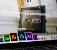 turned-on-laptop-on-desktop-with-hovered-adobe-photoshop-cc-693892