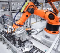 In Győr, Hungary, around 700 Audi employees manufacture electric motors for the Premium Platform Electric (PPE). Pictured: a robot flips the PPE axle