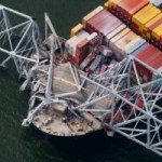 The Dali container vessel after striking the Francis Scott Key Bridge that collapsed into the Patapsco River in Baltimore, Maryland, US, on Tuesday, March 26, 2024. The commuter bridge collapsed after being struck by a container ship, causing vehicles to plunge into the water and halting shipping traffic at one of the most important ports on the US East Coast. Photographer: Al Drago/Bloomberg via Getty Images