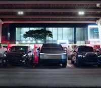 hummer-ev-tesla-model-y-tesla-cybertruck-ford-mustang-mach-e-and-rivian-r1t-at-a-tesla-supercharger-station