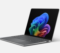 Render of a Surface Laptop 5G with Intel, platinum, front-facing left 3/4 view