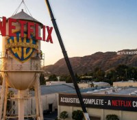 Netflix confirme le rachat de Warner Bros Discovery // Source : Image générée avec Gemini Nano Banana