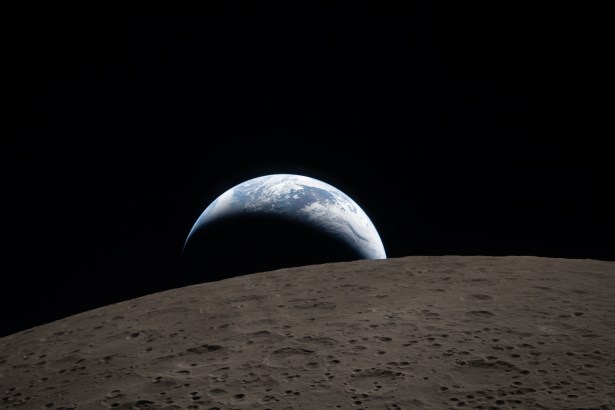 art002e009288 (April 6, 2026) &ndash; Earthset captured through the Orion spacecraft window at 6:41 p.m. EDT, April 6, 2026, during the Artemis II crew&rsquo;s flyby of the Moon. A muted blue Earth with bright white clouds sets behind the cratered lunar surface.
The dark portion of Earth is experiencing nighttime. On Earth&rsquo;s day side, swirling clouds are visible over the Australia and Oceania region.  
In the foreground, Ohm crater has terraced edges and a flat floor interrupted by central peaks. Central peaks form in complex craters when the lunar surface, liquefied on impact, splashes upwards during the crater&rsquo;s formation.