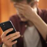 medium-shot-suffering-teenager-being-cyberbullied
