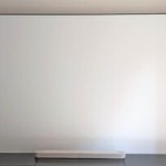 Toile de projection Nothing Projector Matte White motorisée par le sol // Source : Sylvain Pichot - Frandroid Toile de projection Nothing Projector Matte White motorisée par le sol // Source : Sylvain Pichot - Frandroid
