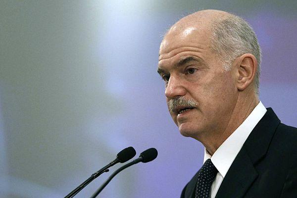 Greece’s Prime Minister George Papandreou delivers a speech during an economic conference in Athens