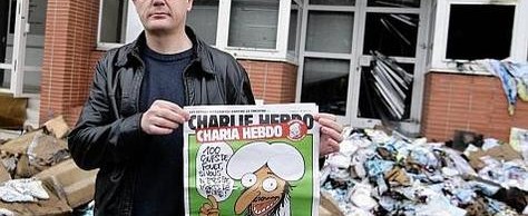 phpThumb_generated_thumbnailjpg Luz, le dessinateur de Charlie Hebdo, sa couv' et les décombres