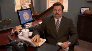 Ron-Swanson-Trying-to-Eat-Burger