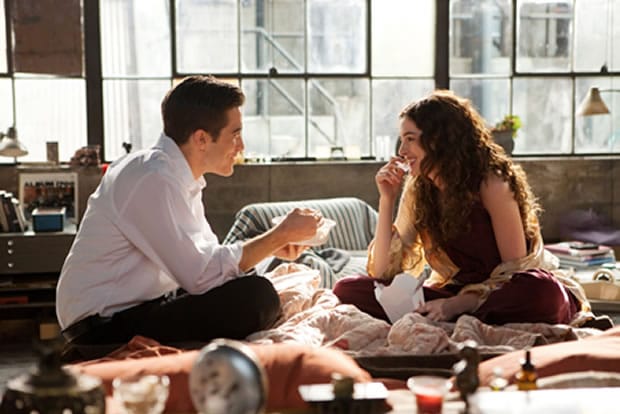 love and other drugs couple eating on the bed
