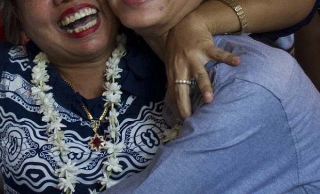 Family members welcome student protest leader Phyo Phyo Aung (R) as she arrives for a hearing at her trial in Tharrawaddy town, Bago Region in Myanmar on April 8, 2016. - Myanmar's Aung San Suu Kyi on April 7, vowed to press for the release of political prisoners and student activists, hinting that a mass amnesty may be imminent as her government seeks to stamp its mark on power in the former junta-run nation. (Photo by YE AUNG THU / AFP) Family members welcome student protest leader Phyo Phyo Aung (R) as she arrives for a hearing at her trial in Tharrawaddy town, Bago Region in Myanmar on April 8, 2016. - Myanmar's Aung San Suu Kyi on April 7, vowed to press for the release of political prisoners and student activists, hinting that a mass amnesty may be imminent as her government seeks to stamp its mark on power in the former junta-run nation. (Photo by YE AUNG THU / AFP)