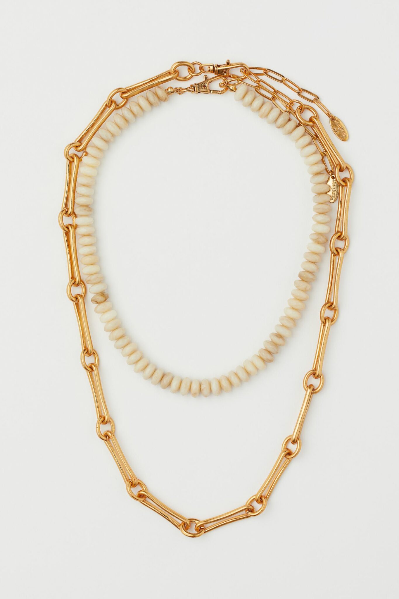Lot de 2 colliers, lemlem x H&M, 24,99€. Lot de 2 colliers, lemlem x H&M, 24,99€.