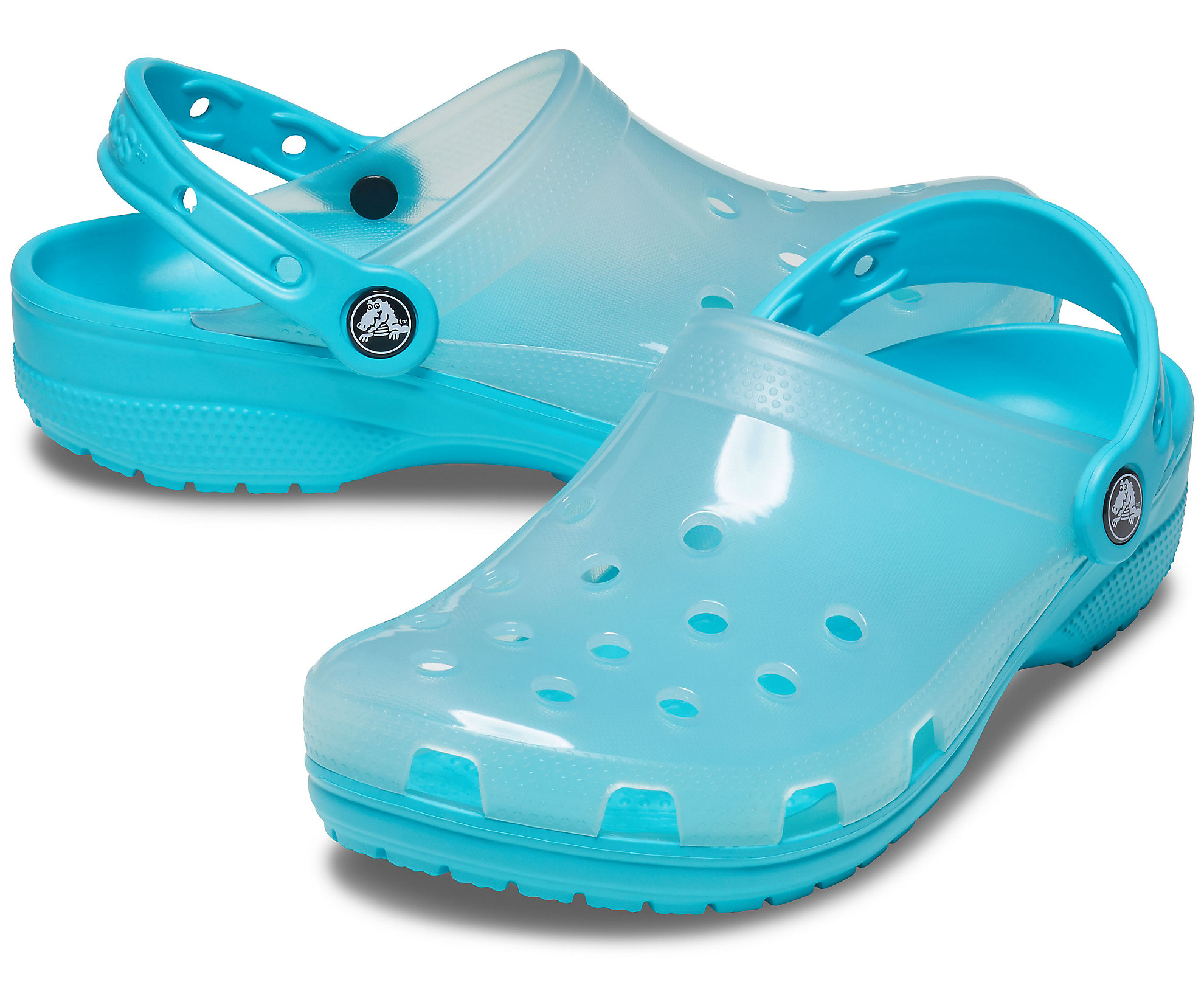 Crocs translucides bleues, 49,99€.