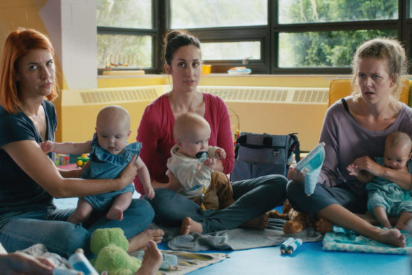 Trois mères avec leur bébé en atelier parental