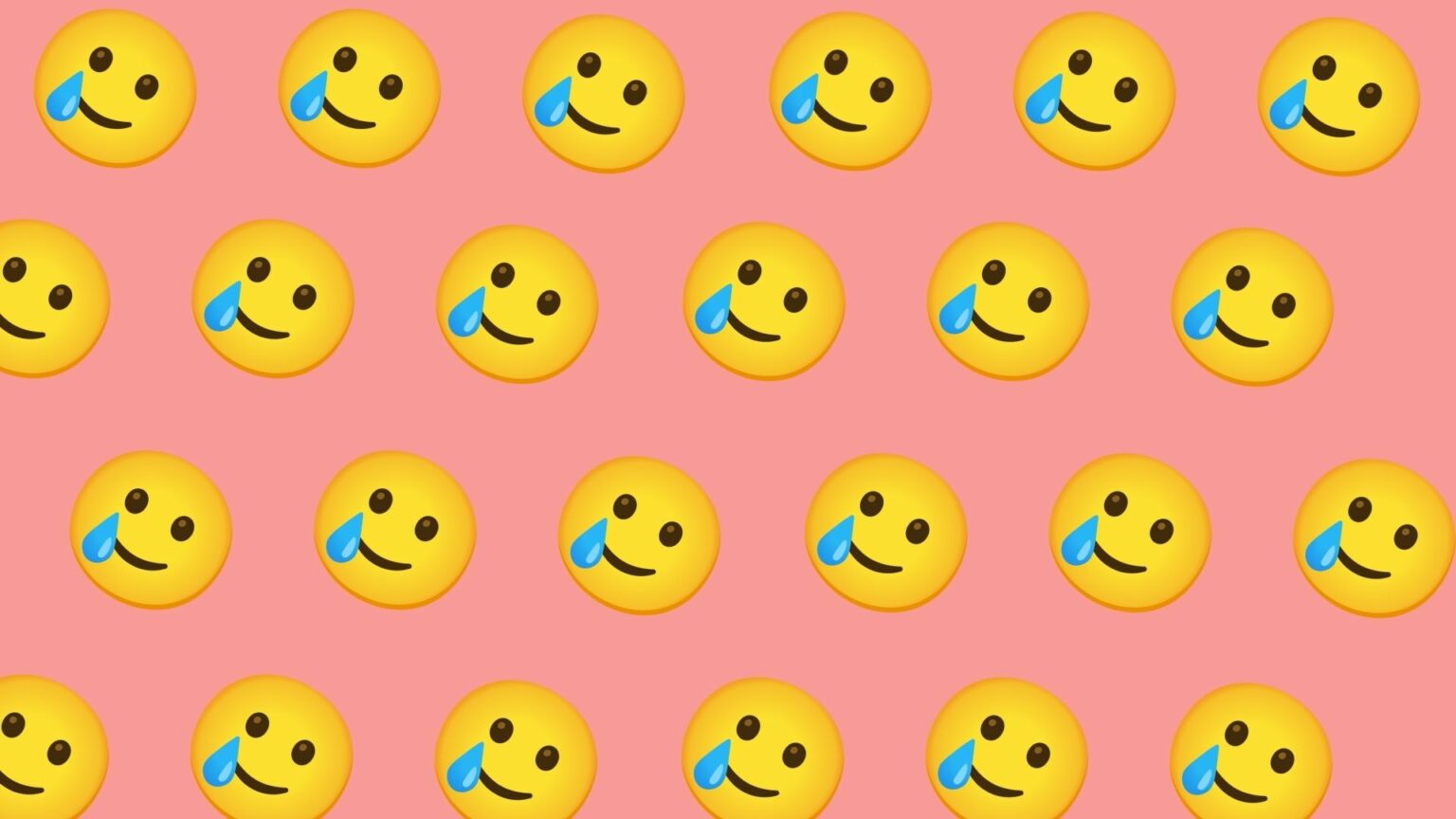 L'emoji qui sourit avec une larme. L'emoji qui sourit avec une larme.