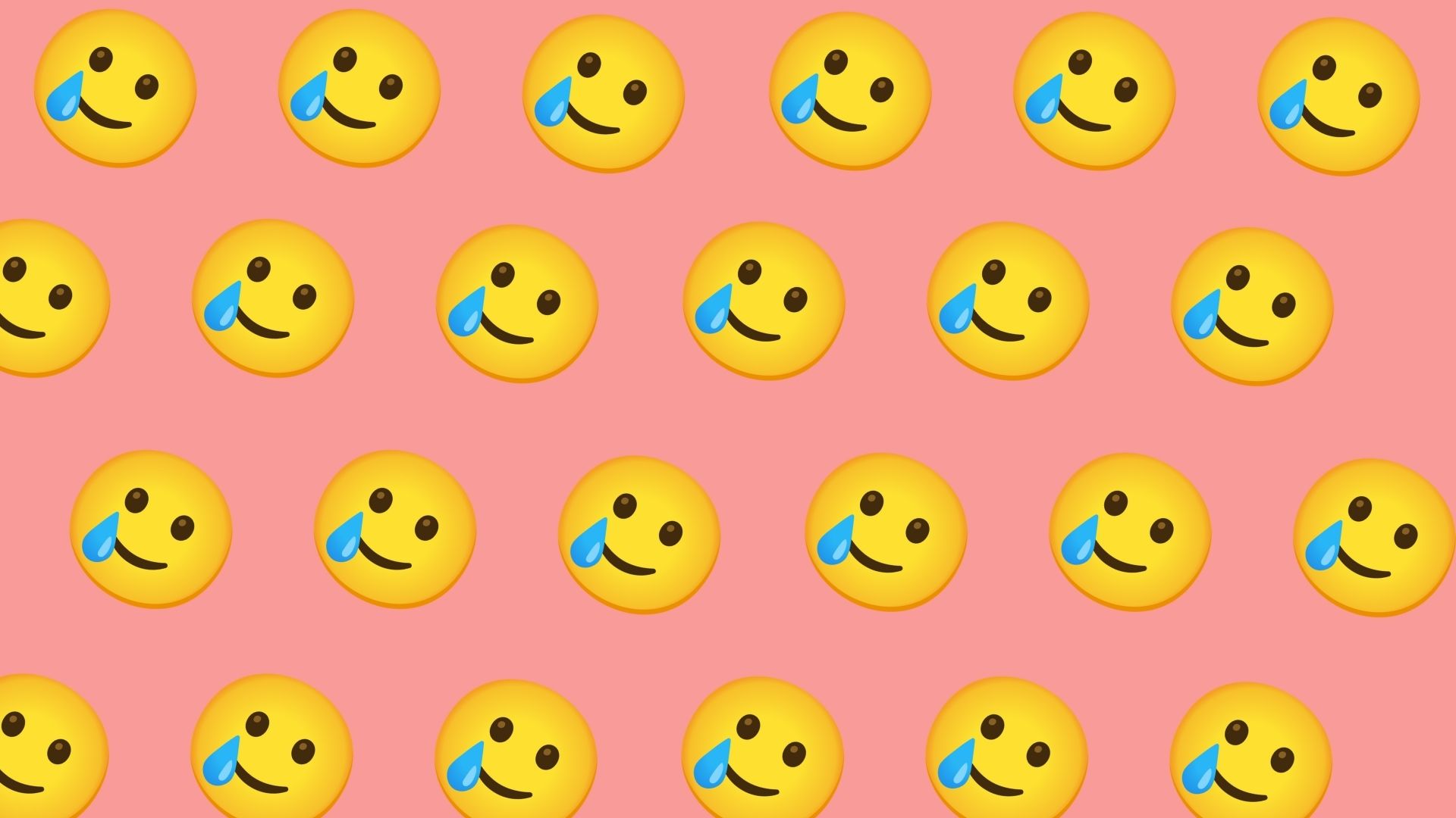 L'emoji qui sourit avec une larme.