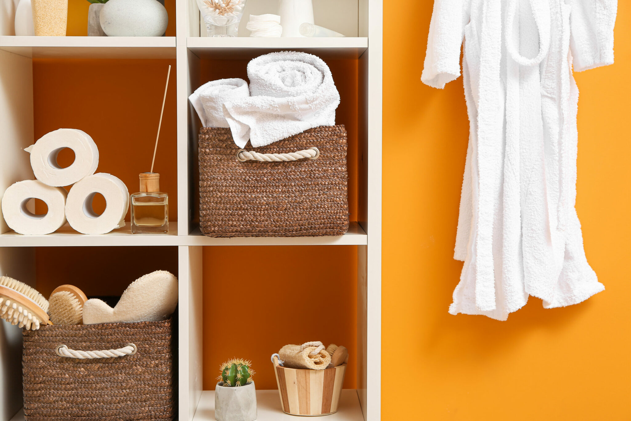 Body care cosmetics with accessories on rack in bathroom Body care cosmetics with accessories on rack in bathroom