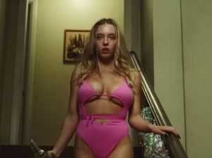 53572207-10458551-Swimsuit_While_he_s_talking_to_her_Cassi_comes_down_in_a_pink_sw-m-92_1643614916085 53572207-10458551-Swimsuit_While_he_s_talking_to_her_Cassi_comes_down_in_a_pink_sw-m-92_1643614916085