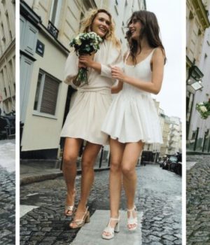 Deux femmes en train de se marier en robe blanche et chaussures à talon Mellow Yellow dans les rues de Paris pour un mariage civil // Source : Mellow Yellow
