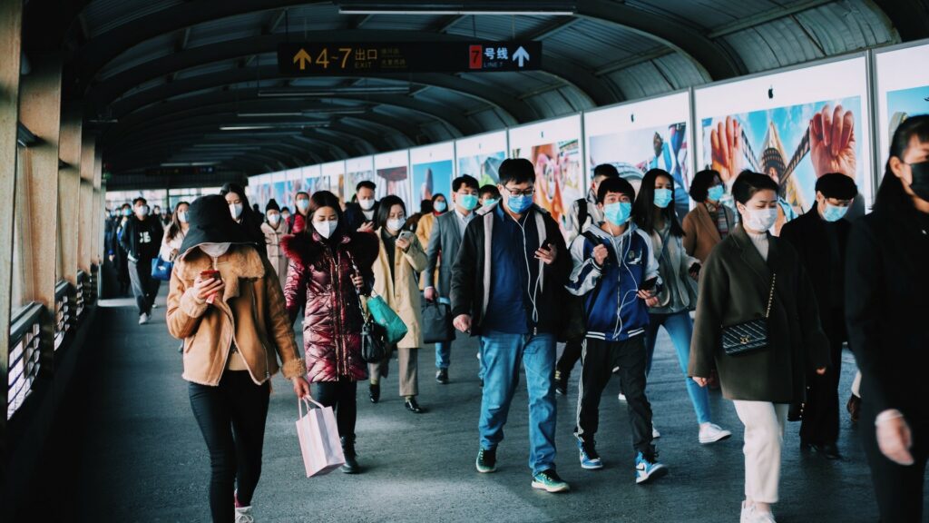people-standing-on-train-station-3960133
