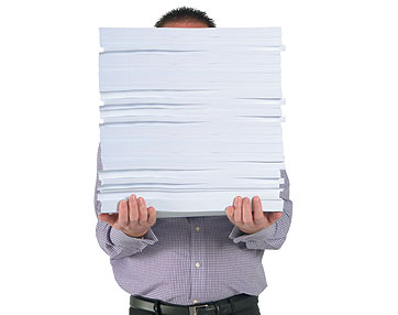 man-with-pile-of-paper1.jpg