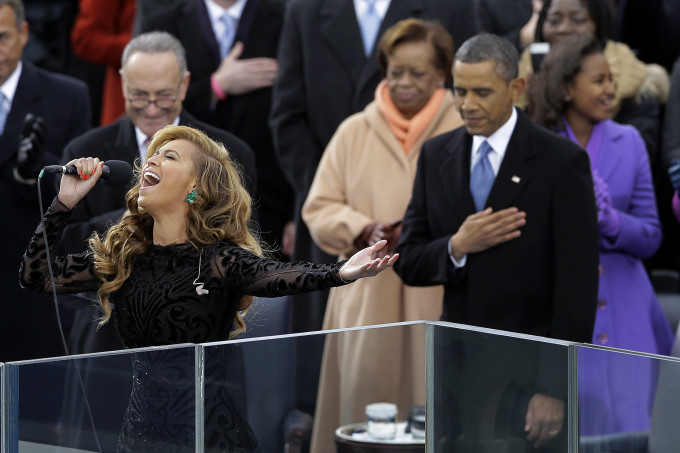 President Barack Obama as Beyonce sings the National Anthem at the ceremonial swearing-in at the U.S. Capitol during the 57th Presidential Inauguration in Washington, Monday, Jan. 21, 2013. (AP Photo/Carolyn Kaster)