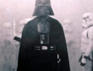 In this 1977 image provided by 20th Century-Fox Film Corporation, Darth Vader, played by David Prowse and voiced by James Earl Jones, and his Imperial stormtroopers take over the Rebel Blockade Runner in a scene from "Star Wars." The intergalactic adventure launched in theaters 35 years ago on May 25, 1977, introducing the world to The Force, Luke Skywalker, Darth Vader, Princess Leia, Han Solo and a pair of loveable droids named R2-D2 and C-3PO. (AP Photo/20th Century-Fox Film Corporation)
