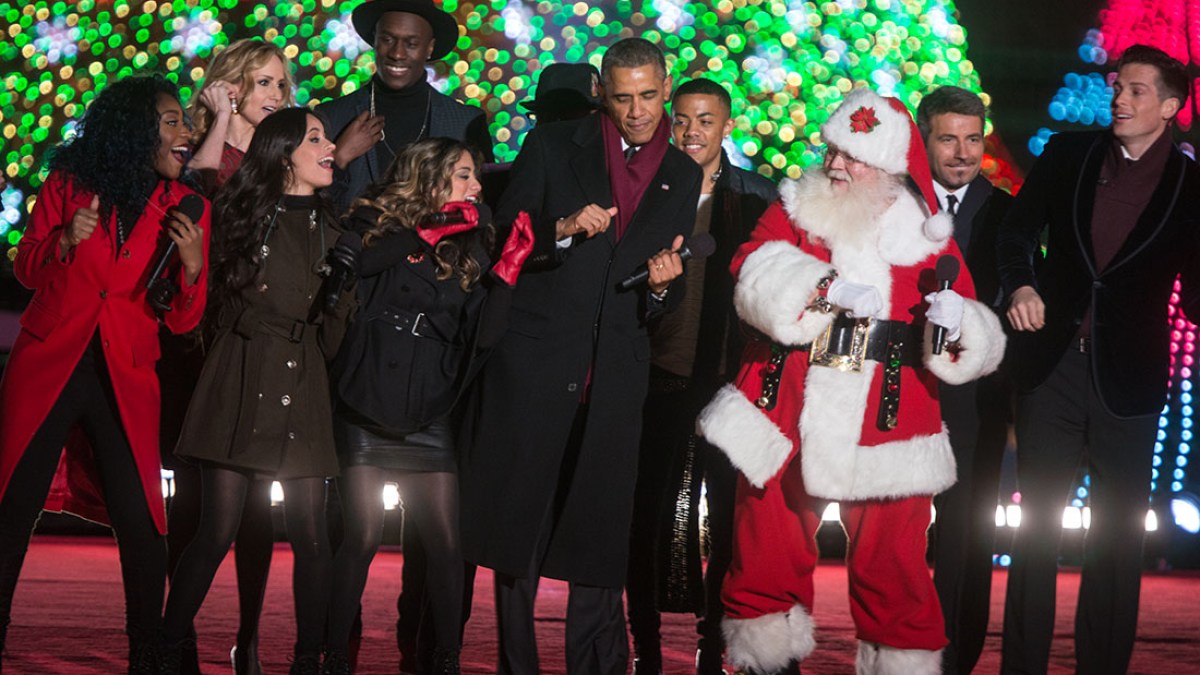 President Barack Obama dances on stage with Fifth Harmony during the singing of “Jingle Bells” during the National Christmas Tree lighting on the Ellipse in Washington, D.C., Dec. 4, 2014. (Official White House Photo by Lawrence Jackson)