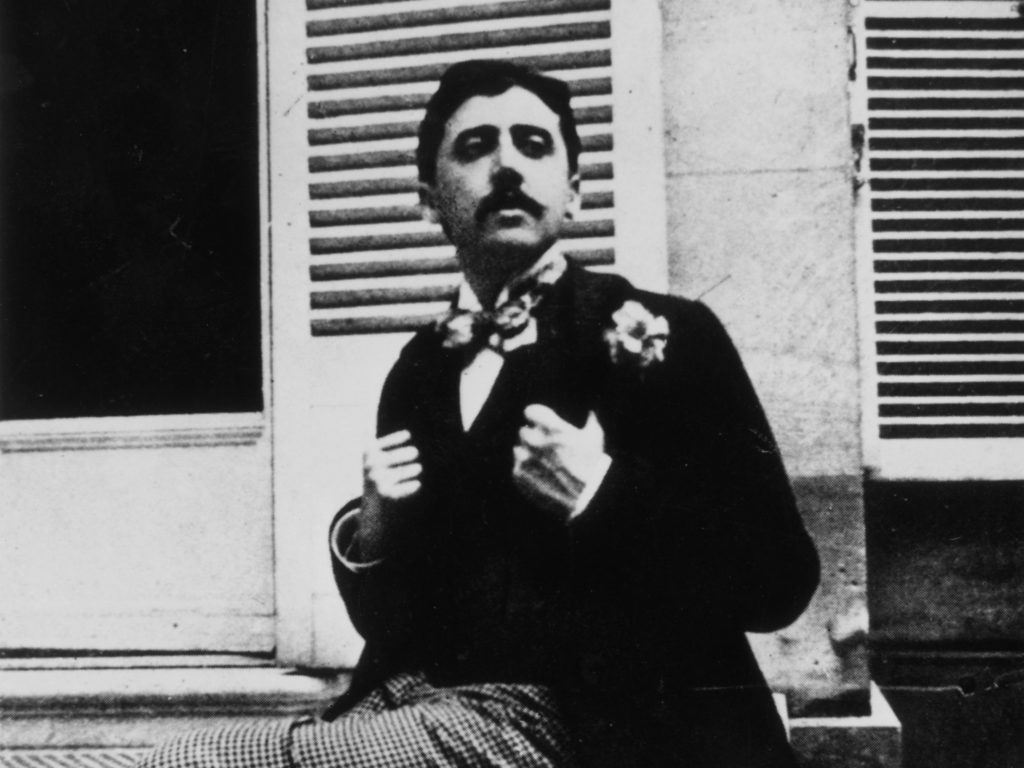 circa 1910:  French author Marcel Proust (1871 - 1922) sitting outside a window.  (Photo by Hulton Archive/Getty Images)