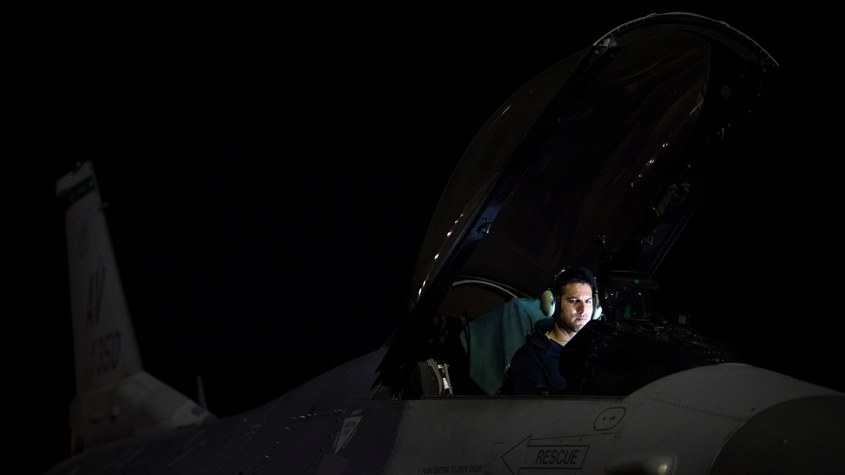 Staff Sgt. Erick Vega, an avionics specialist with the 555th Fighter Squadron out of Aviano Air Base, Italy, attempts to determine if his equipment or falling, or if the space systems aboard the F-16 Fighting Falcon is being attacked by simulated enemy forces through space warfare during exercise Red Flag at Nellis Air Force Base, Nevada, July 21, 2016. Red Flag 16-3 is aimed at teaching service members how to integrate air, space and cyberspace elements. (U.S. Air Force photo/Tech. Sgt. David Salanitri)