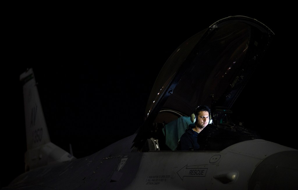 Staff Sgt. Erick Vega, an avionics specialist with the 555th Fighter Squadron out of Aviano Air Base, Italy, attempts to determine if his equipment or falling, or if the space systems aboard the F-16 Fighting Falcon is being attacked by simulated enemy forces through space warfare during exercise Red Flag at Nellis Air Force Base, Nevada, July 21, 2016. Red Flag 16-3 is aimed at teaching service members how to integrate air, space and cyberspace elements. (U.S. Air Force photo/Tech. Sgt. David Salanitri)