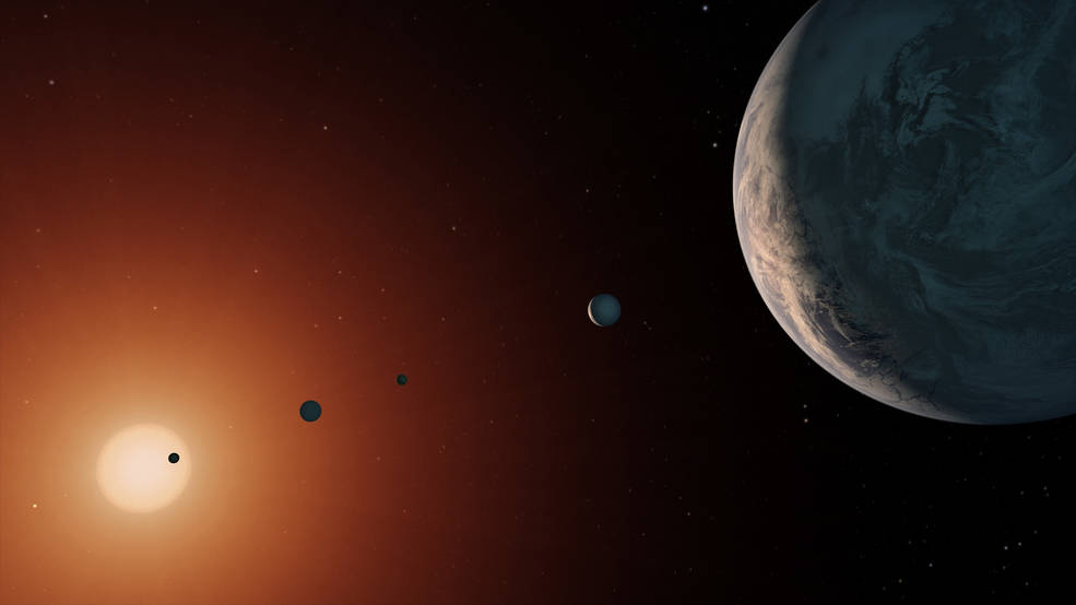 Le système Trappist imaginé par la Nasa, à droite, Trappist-1F / Nasa