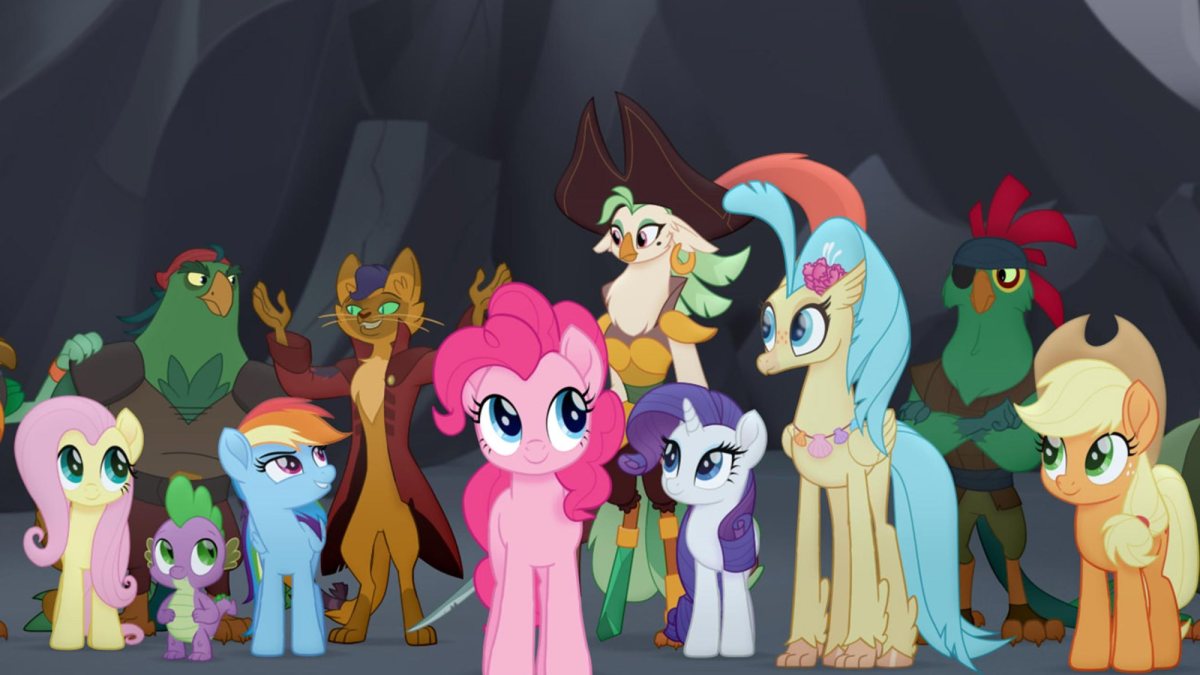 From L to R: Fluttershy (Andrea Libman), Spike (Cathy Weseluck), Rainbow Dash (Ashleigh Ball), Pinkie Pie (Andrea Libman), Rarity (Tabitha St. Germain), Princess Skystar (Kristin Chenoweth) and Applejack (Ashleigh Ball) in MY LITTLE PONY: THE MOVIE.