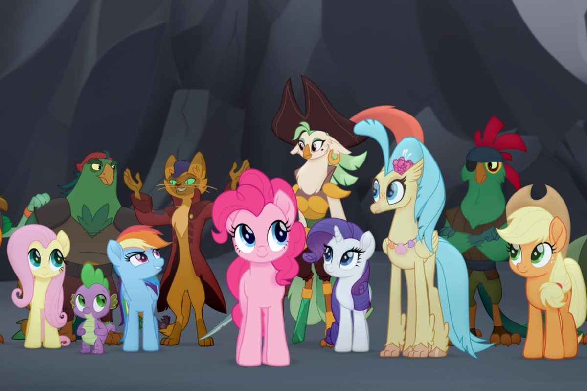 From L to R: Fluttershy (Andrea Libman), Spike (Cathy Weseluck), Rainbow Dash (Ashleigh Ball), Pinkie Pie (Andrea Libman), Rarity (Tabitha St. Germain), Princess Skystar (Kristin Chenoweth) and Applejack (Ashleigh Ball) in MY LITTLE PONY: THE MOVIE.