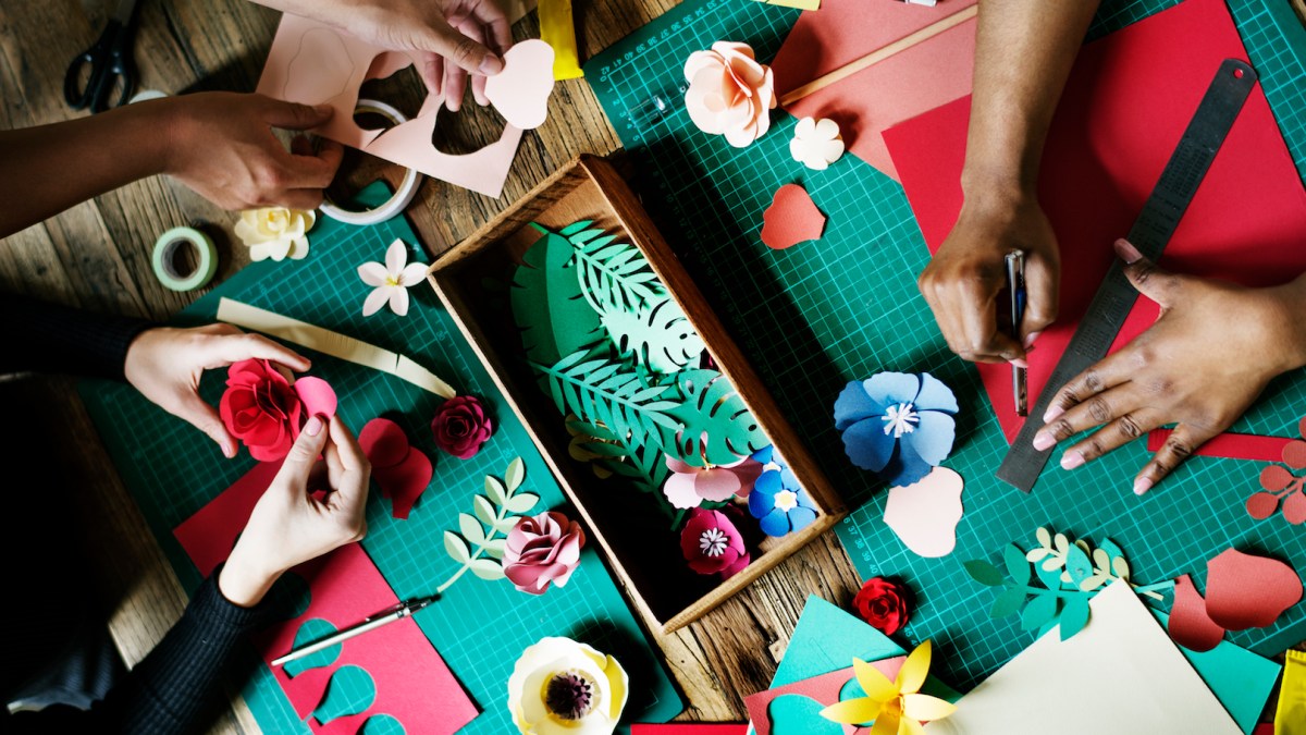 People Making Paper Flowers Craft Art Work Handicraft