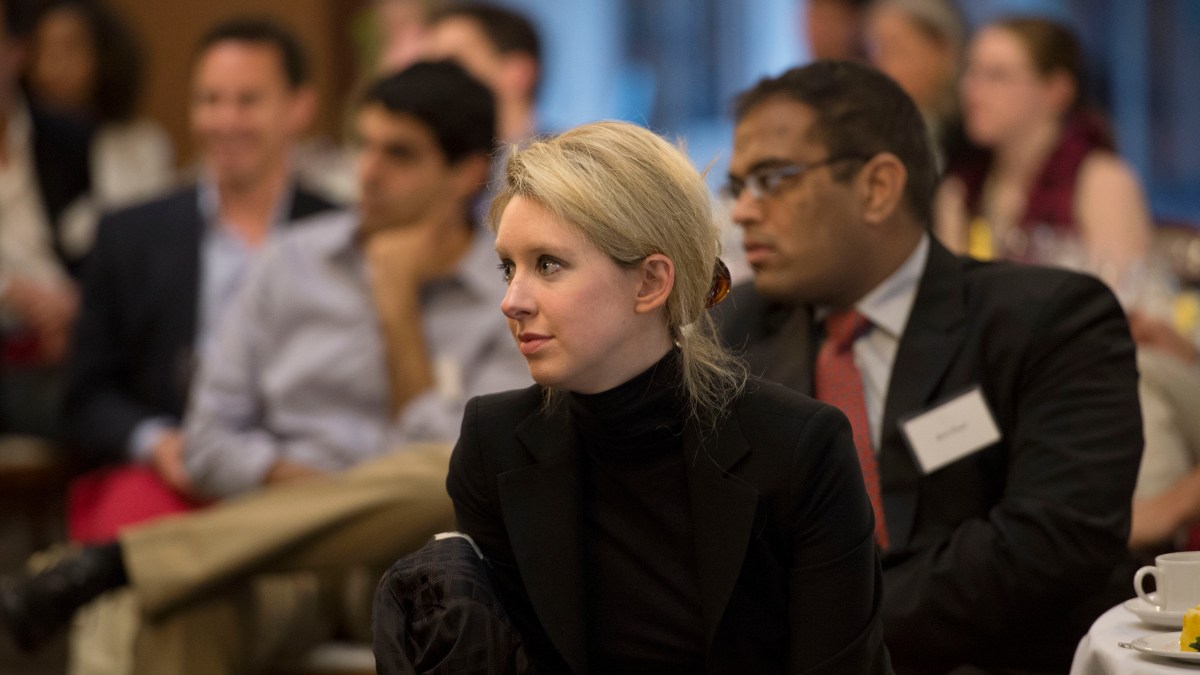 Elizabeth Holmes, the chief executive officer and founder of Theranos, a health care technology company, listens as Deputy Secretary of Defense Ash Carter speaks at Stanford University in Palo Alto, Calif., April 17, 2013. (DoD photo by Glenn Fawcett/Released)