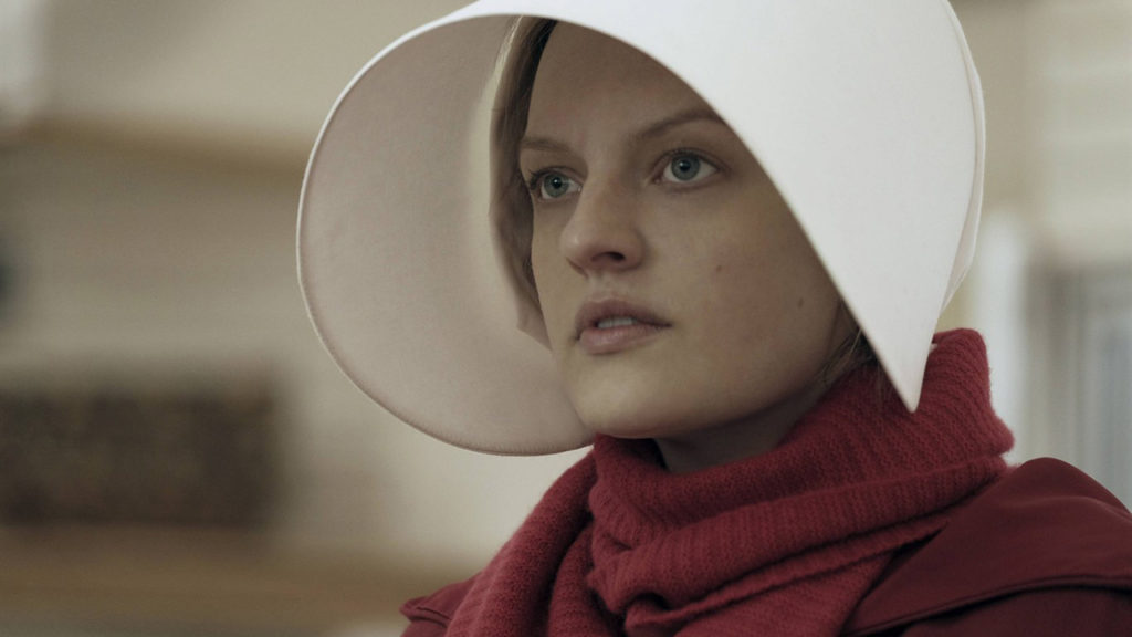 This image released by Hulu shows Elisabeth Moss as Offred in a scene from, "The Handmaid's Tale." Moss is nominated for an Emmy Award for outstanding lead actress in a drama series . The Emmy Awards ceremony, will air on Sept. 17. (George Kraychyk/Hulu via AP)