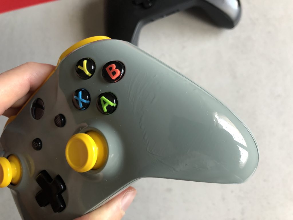 Test huile sur la manette anti-gras // Source : Numerama Test huile sur la manette anti-gras // Source : Numerama