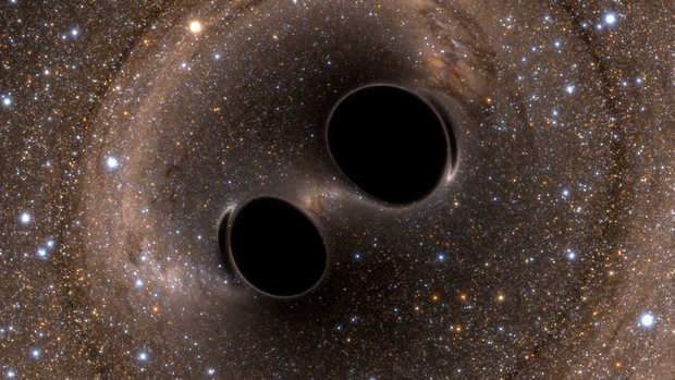 Une collision de 2 trous noirs. // Source : Wikimedia/CC/Simulating eXtreme Spacetimes Lensing (SXS)