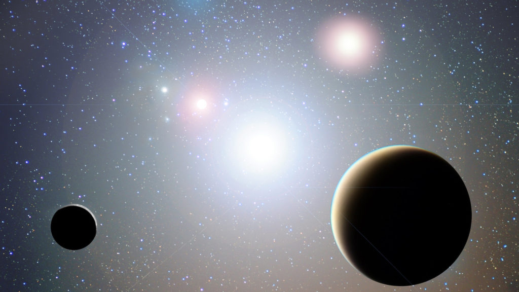Une planète et sa lune dans un système à 3 étoiles. // Source : Flickr/CC/Maxwell Hamilton (photo recadrée)