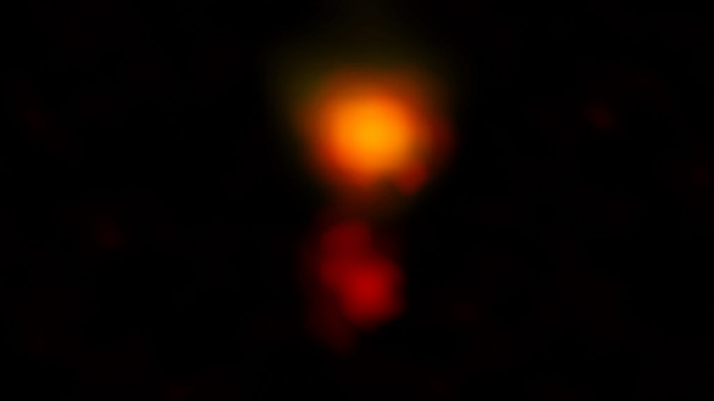 L'image radio de la galaxie MAMBO-9. // Source : ALMA (ESO/NAOJ/NRAO), C.M. Casey et al.; NRAO/AUI/NSF, B. Saxton