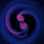 Deux trous noirs en orbite l'un autour de l'autre. // Source : Flickr/CC/NASA’s Goddard Space Flight Center
