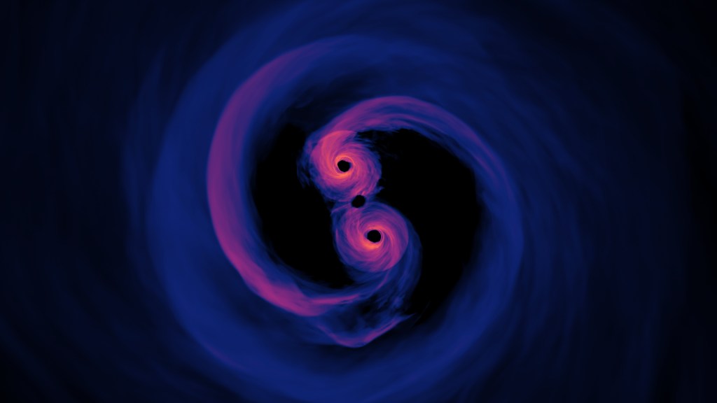 Deux trous noirs en orbite l'un autour de l'autre. // Source : Flickr/CC/NASA’s Goddard Space Flight Center