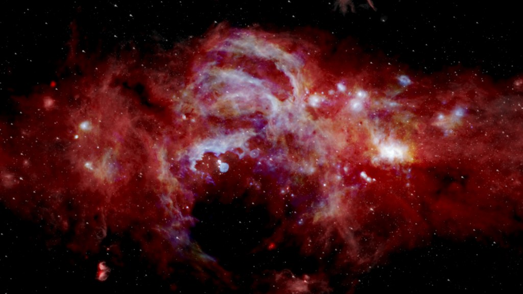 Le centre de la Voie lactée. // Source : NASA/SOFIA/JPL-Caltech/ESA/Herschel (photo recadrée)