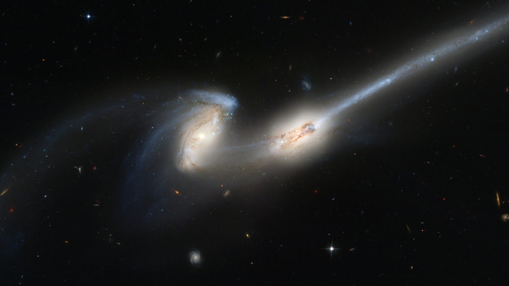 A merger between two galaxies.  // Source: PublicDomainPictures/CC0 Public domain (cropped photo)